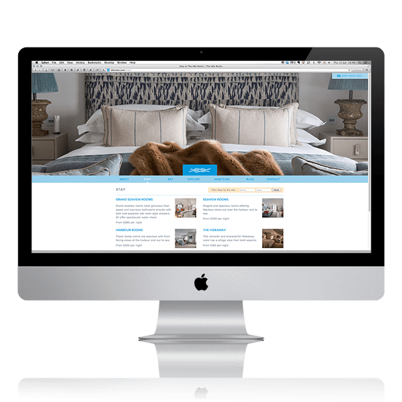 An iMac displaying a website design for the Idle Rocks hotel | Tribus Creative - design services for small businesses